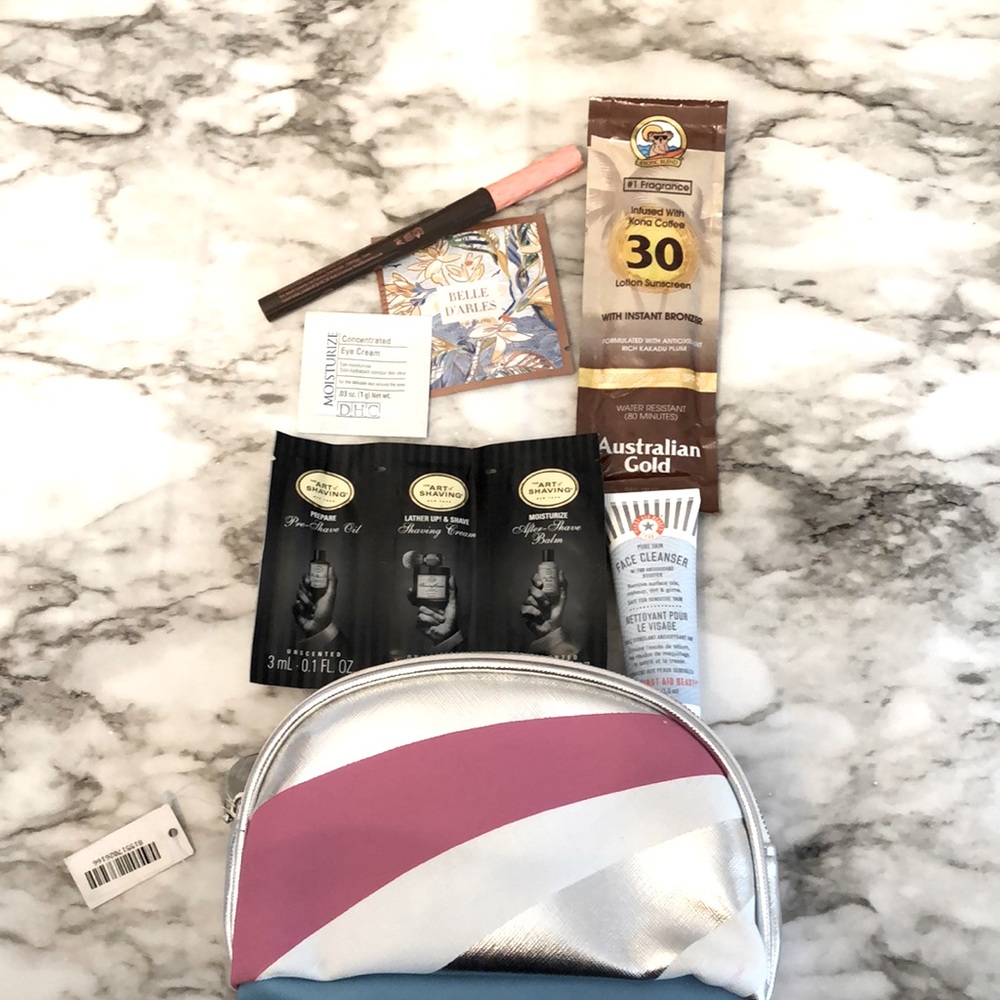 Brand new make up bag with samples, full & deluxe